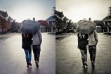 Couple with Umbrella Walking in the Rain
