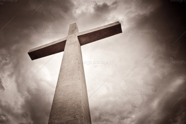 Sepia Tone Cross on Stormy Background